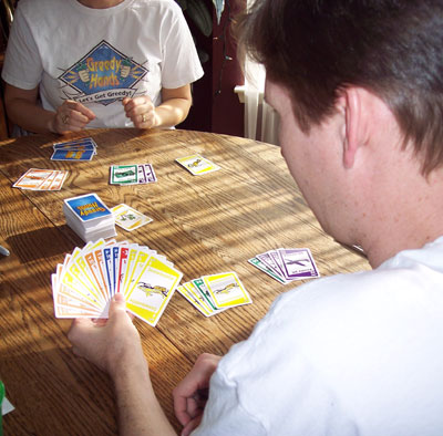 Over-the-sholder shot of Andy's cards